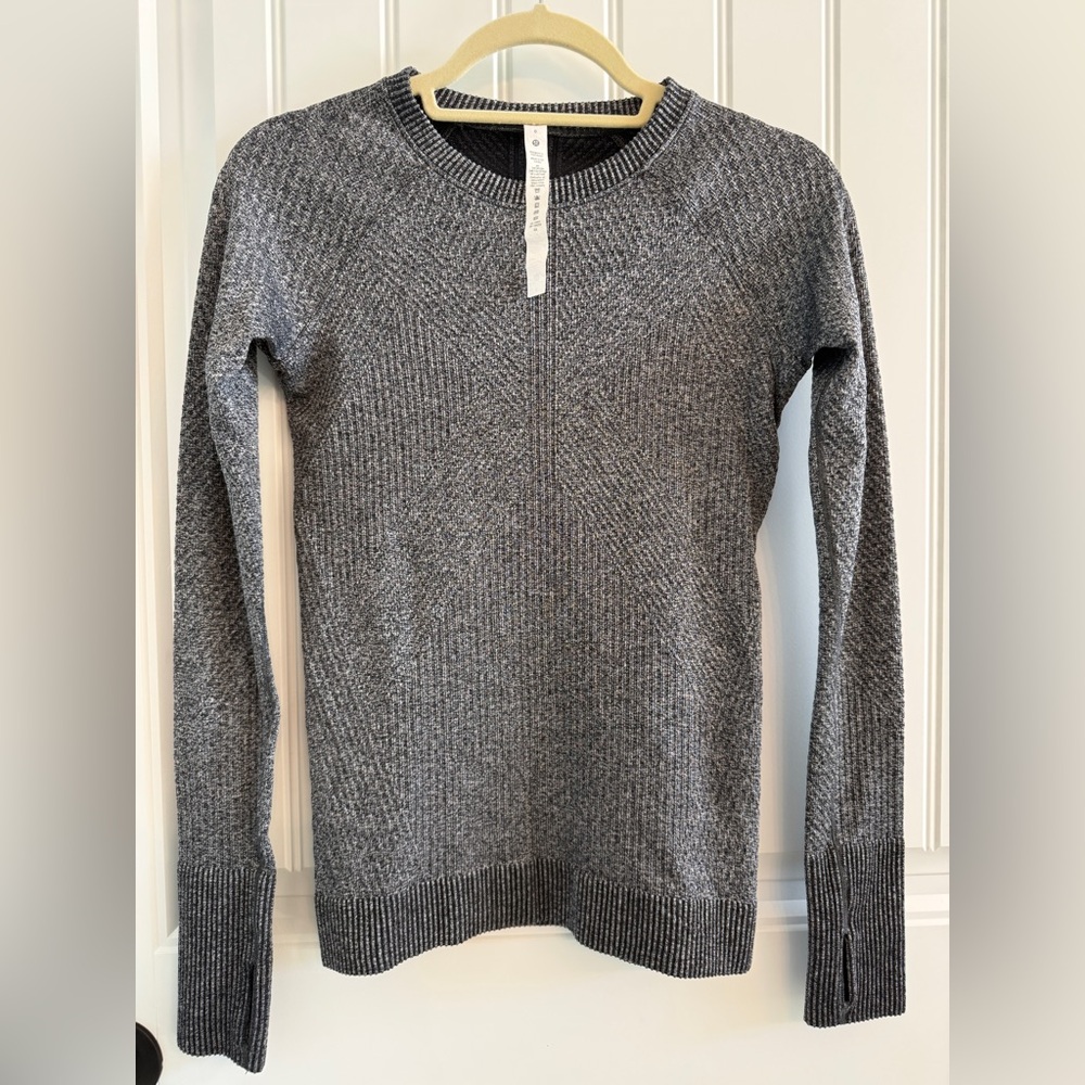 Lululemon women’s long sleeved (with thumb holes) size 6 shirt.